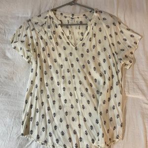 White and black patterned blouse